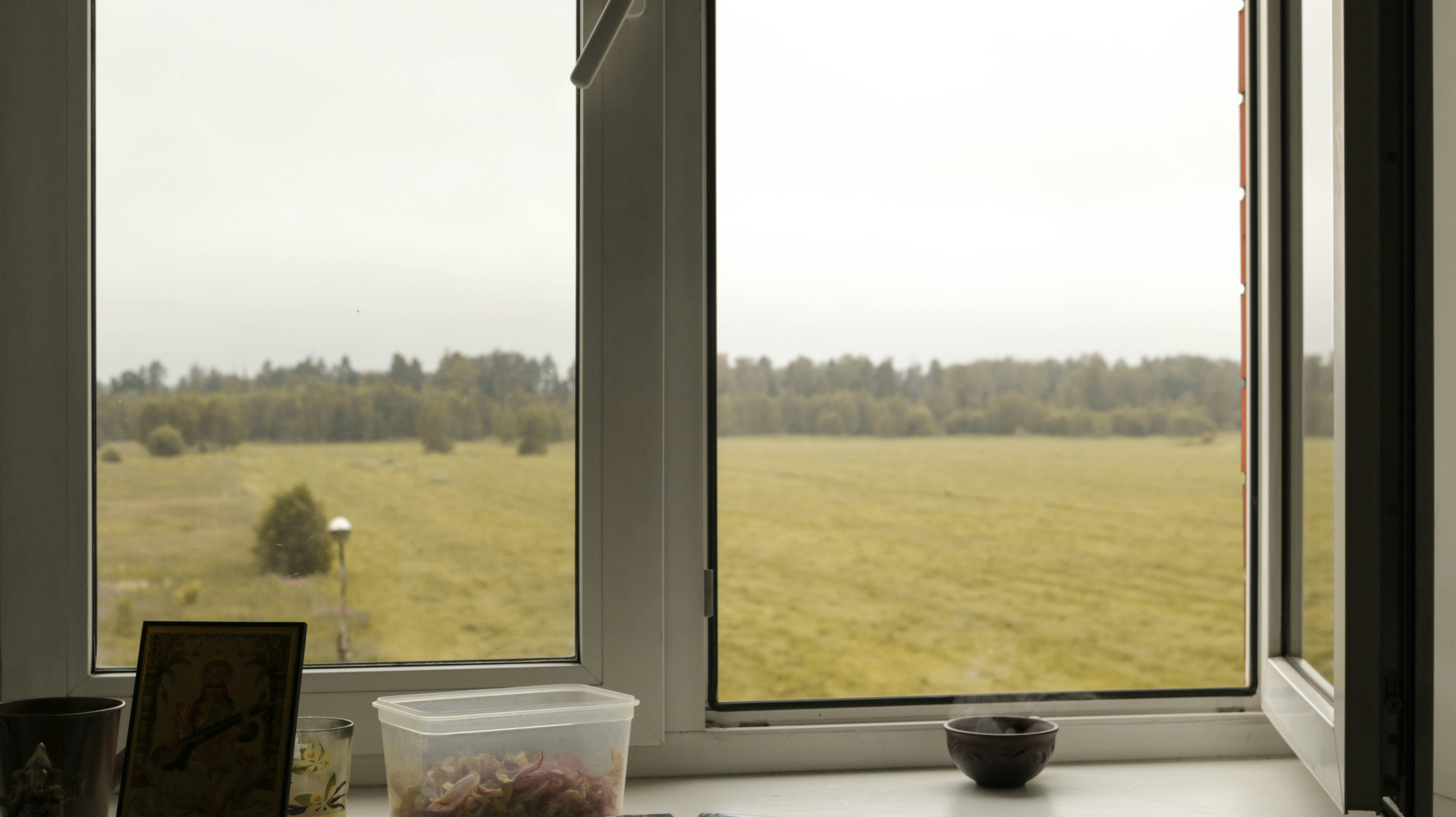 white wooden framed glass window